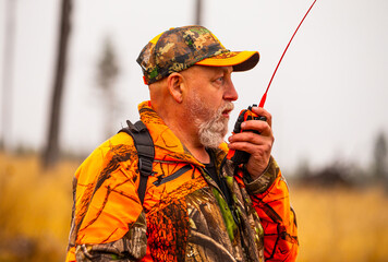 Hunter outdoor in the wilderness during hunting season