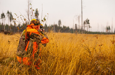 Hunter outdoor in the wilderness during hunting season