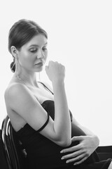 Fototapeta premium a young pregnant girl in a dress