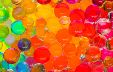 Colorful glass balls or jelly beans. Perfect for background and wallpaper. Colorful bubbles patterns 