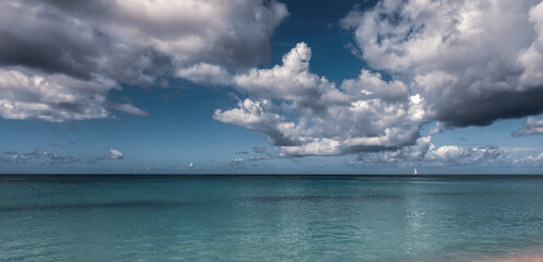 Fototapeta na wymiar The Caribbean Sea on Antigua and Barbuda Beach.