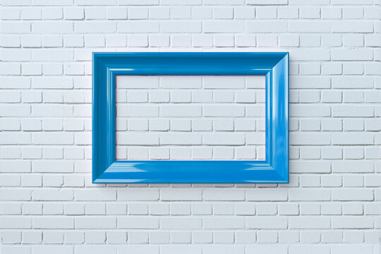 3D Rendering, white brick wall and blue frame. Blue blank frame hanging on white brick wall.