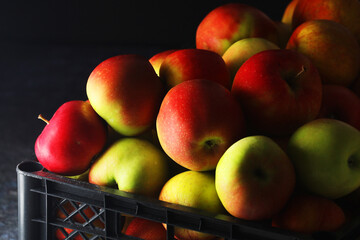 A box with ripe apples