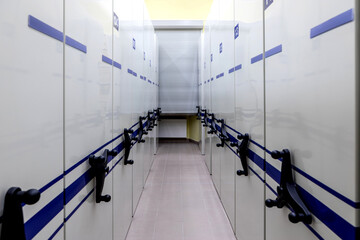 archive, file, registration , mobile shelves with documents. Archive or office