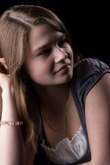 Portrait of young girl with long brown hair