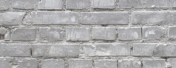 Gray monochrome brick wall texture background. Old Brickwork wide banner