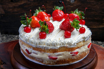 Chocolate, strawberry and whipped cream cake