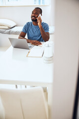 Entrepreneur having a business call in his apartment