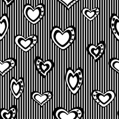 Seamless vector pattern. Stylized black-and-white hearts set against a background of frequent, narrow stripes.