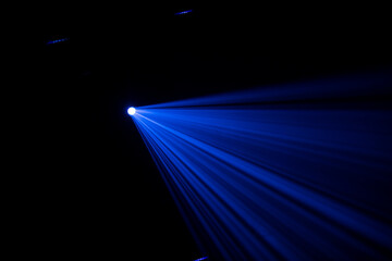 spotlight lightbeams in the dark