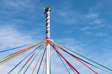 Coloured ribbons on a traditional English maypole.