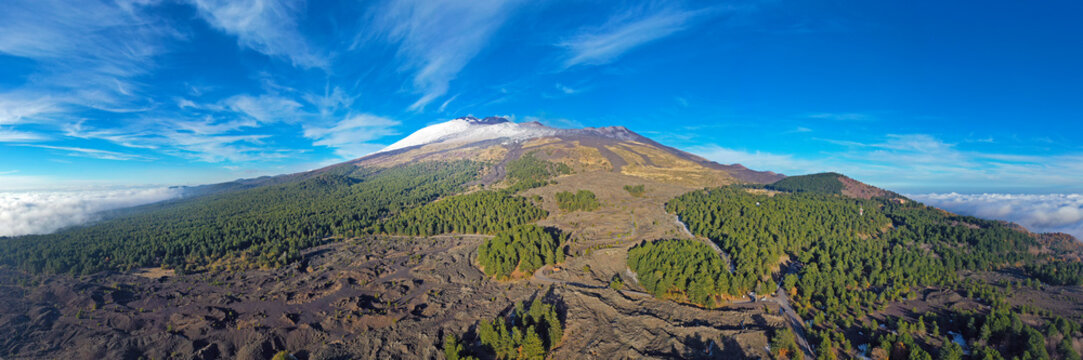 Panoramic view in virtual reality at 180 degrees of the Etna volcano surrounded by woods, lava flows and secondary craters in autumn. Sicily Italy.