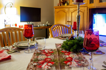Red glasses on the table in the evening
