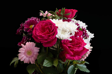 A Bunch of Easter or other Occasion Flowers with Roses included in the Bunch.