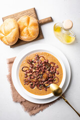 Vegan Red Kidney Bean Soup with caramelized onions  and herbs. Top view. Vertical image.