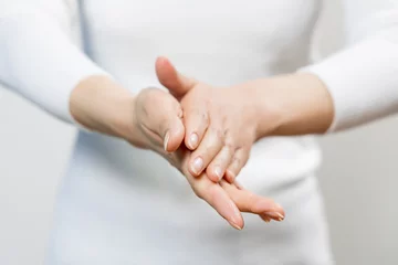 Foto op Plexiglas rub hands with alcohol disinfection © Ken Tyler