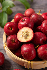 Red Hawthorn Berries on wooden table.