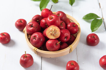 Red Hawthorn Berries on wooden table.
