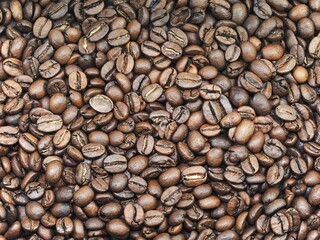 Roasted coffee beans background. 