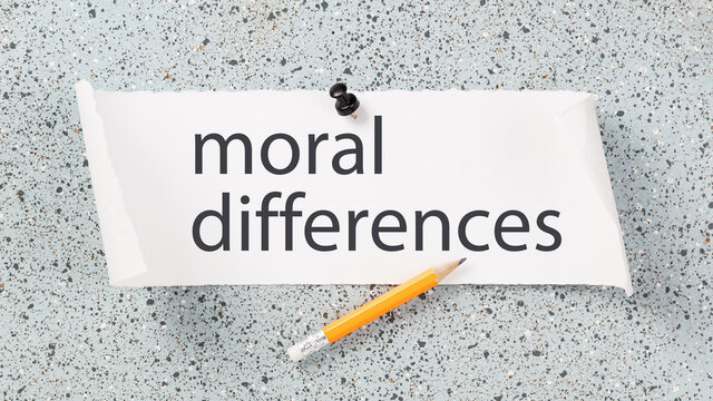 Ethical or legal and political discrimination. Moral differences text on a notice board. Moral divides and diversity. Morality and culture.