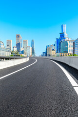 Asphalt road and modern city commercial buildings in Beijing,China.