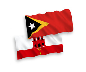 Flags of East Timor and Gibraltar on a white background