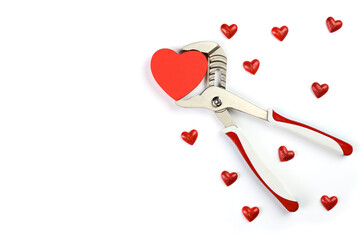 . Wrench with hearts isolated on background. The concept of your favorite profession and Valentine's Day.