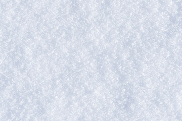 White clean shiny snow background texture. fresh snow  seamless texture. snowy surface closeup
