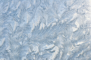 Frost design on a window in winter. Ice design, nature abstract, december texture and pattern