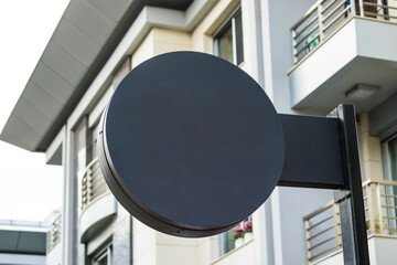 signboard mockup and template empty frame for logo or text on exterior street advertising city shop...