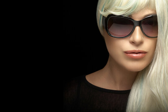 Beautiful blond woman in sunglasses