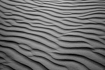 Sand ripples form graphic patterns on the beach