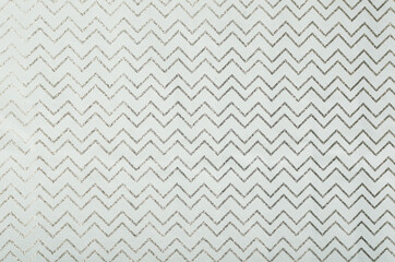 Empty wrapping paper with zigzag decorative lines.Blank space