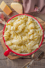 Mac and cheese, american style macaroni pasta in cheesy white sauce