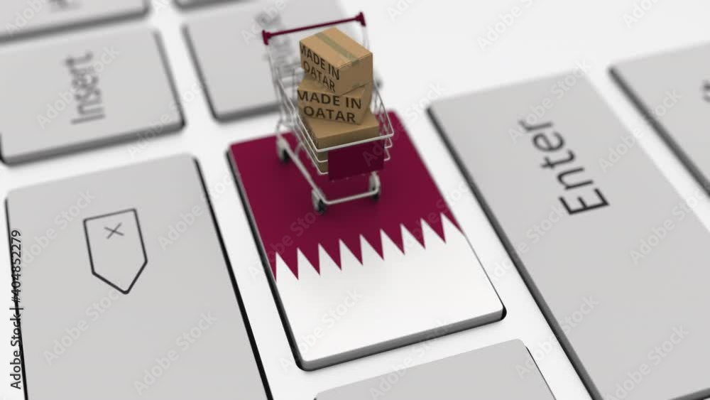 Poster cartons with made in qatar text and shopping cart on the computer keyboard. conceptual looping 3d an