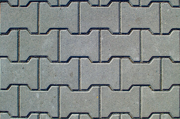 Texture of concrete pavement or sidewalk with paving slabs
