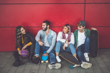 Fototapeta premium Group of teenagers making activities after school