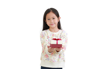 Little asian kid girl give you a gift box on white background. Happy new year and Merry christmas concept. Focus at child face