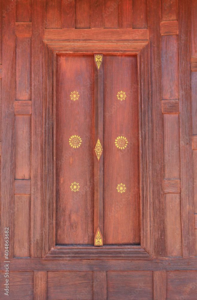 Wall mural Thai style wooden window on wood wall background