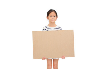 Pretty asian little child girl holding empty brown big board for media banner isolated over white...