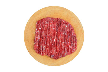 Chopped fine beef on circle wood cutting board isolated on white background. Raw minced meat on wooden block