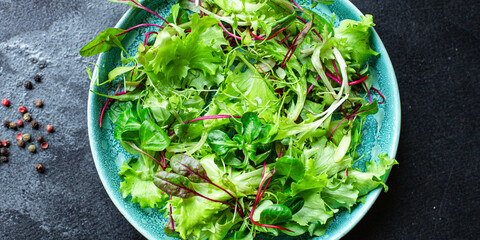 green salad lettuce mix juicy microgreen snack ready to eat on the table healthy meal snack top...