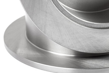 pair of brake discs close-up texture of polished surface of alloy disc.