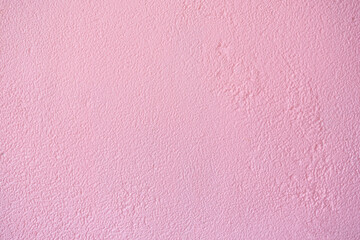 Pink cement or concrete wall texture for background. High resolution through process retouch. Painted concrete wall texture in pastel color. Pink wall background and texture. Pink Cement background.