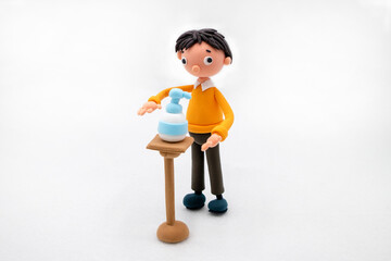 粘土の消毒をする男性