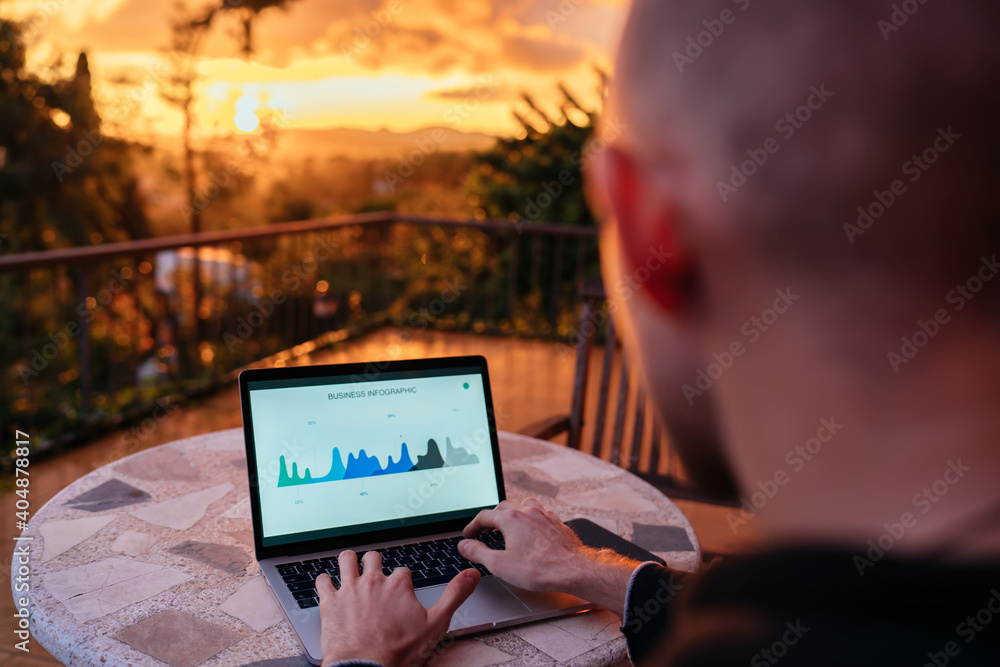 Aufkleber back cropped view of male digital nomad using netbook application for working remotely with revenue 