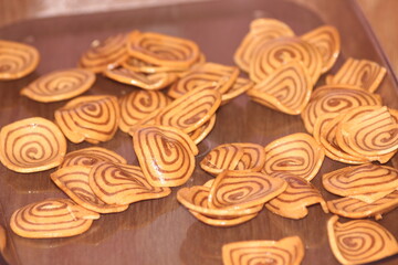 Closeup view with selective focus of a large number of round cookies