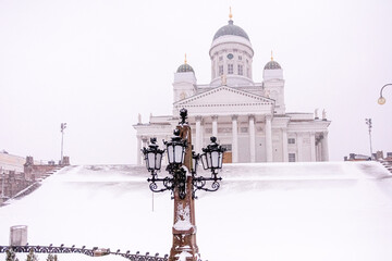 Helsinki, Finland. January 12, 2021 White Church. Heavy snowfall, hurricane, The front staircase is...