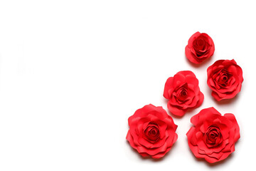 Few handmade red paper roses on white background. Love, Valentine's, mother's, women's day, relations, romantic, wedding template