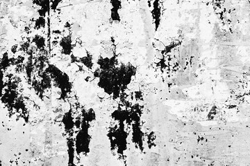 Obraz na płótnie Canvas Texture of a concrete wall with cracks and scratches which can be used as a background